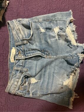 Hidden High-Rise Light Wash Distressed Denim Shorts - Light Blue
